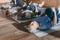 group of senior people stretching in yoga mats