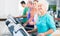 Group with senior people on treadmill in gym