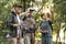 Group of senior trekkers checking a map for direction