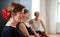 Group of senior women attending dancing class, resting.