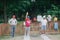 A group of seniors playing a game of horseshoe