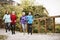 Group of seniors running outdoors in the old town.