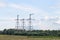 Group silhouette of transmission towers power tower, electricity pylon, steel lattice tower . Texture high voltage