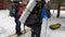 A group of skiers with big backpacks go on a skiing trip. Beautiful winter forest