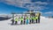 A group of skiers in colored jackets at the top of the final station of the lift. Ski slope in winter on a sunny day. Alpe Cermis,