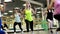 Group Of Slim Beautiful Young Women Doing A Barbell Squats