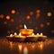 A group of small decorated burning candles on a dark background with a bokech effect. Diwali, the dipawali Indian festival of