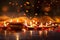 A group of small decorated burning candles on a dark background with a bokech effect. Diwali, the dipawali Indian festival of