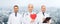 Group of smiling doctors with red heart shape