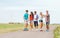 Group of smiling teenagers with skateboards