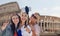 Group of smiling women taking selfie in rome