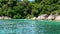 Group of Snorkeling Tourists in Water near Tropical Island, Travel Snorkel Tour