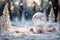 A group of snow globes sitting on top of a snow covered ground