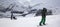 Group of snowboarders starts on off piste descent