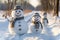 A group of snowmen standing in the snow