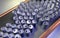 A group of soda cans in a recycling plant