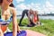 Group of sportive people stretching before starting a workout outdoors