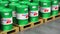 Group of stacked barrels with motor oil lubricant in warehouse