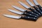 A group of steak knives