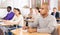 Group of students attentively listening to lecture in classroom