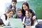 Group of students studying with laptop