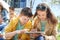 Group of students with tablet pc at school yard