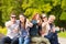 Group of students or teenagers showing thumbs up