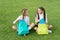 Group study outdoors girls classmates with backpacks, back to school concept