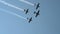 Group of stunt planes overhead