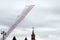 A group of Su-25 `Grach` attack aircraft smoke with the colors of the Russian flag in the sky over Red Square during a parade dedi