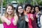 Group of successful international girls standing in line