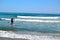 group of surfers surfing inTorremolinos, Costa del Sol, Spain