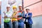 Group of technician or engineer worker stand with confident action or fold arms in cargo shipping workplace area. Concept with