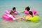 Group of teen girls float and swim in the sea and form like circle together and look fun to play during holiday or vacation