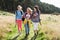 Group Of Teenage Girls Hiking In Countryside