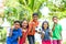 group of teenager kids with football shouting by looking at camera - conecept of excitement, entertainment and