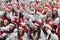 Group of teenagers  dressed as Santa Claus took part in the city Christmas festival