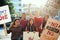 Group of teenagers protesting demonstration holding posters antiwar justice peace concept