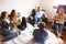 Group Of Teenagers Relaxing In Bedroom