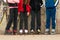 Group of teenagers in roller skates standing