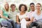 Group Of Teenagers Sitting On A Couch