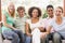 Group Of Teenagers Sitting On A Couch