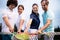 Group of tennis player handshaking after playing a tennis match. Fairplay, sport concept.