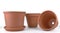 group of terra cotta flower pots empty