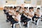 A group of Thai student in their school uniform is praying to th