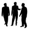 Group of three businessmen walking and talking