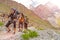 Group of three hikers on trail