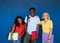 Group of three multi-ethnic teenage students with backpack