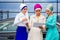 Group of three successful business female students Muslims women in stylish veiled hijab a turban headscarf is tied up