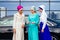 Group of three successful business multinational Muslims women in stylish veiled hijab a turban headscarf is tied up on